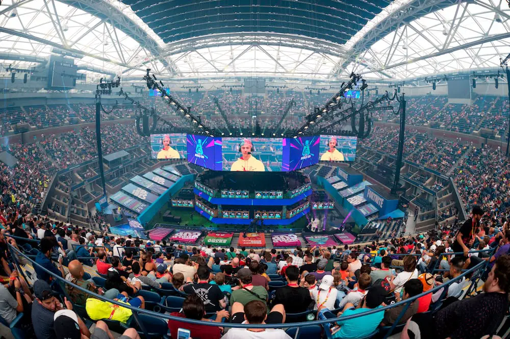 top 5 sports industry trends with image of esports event with fans and players