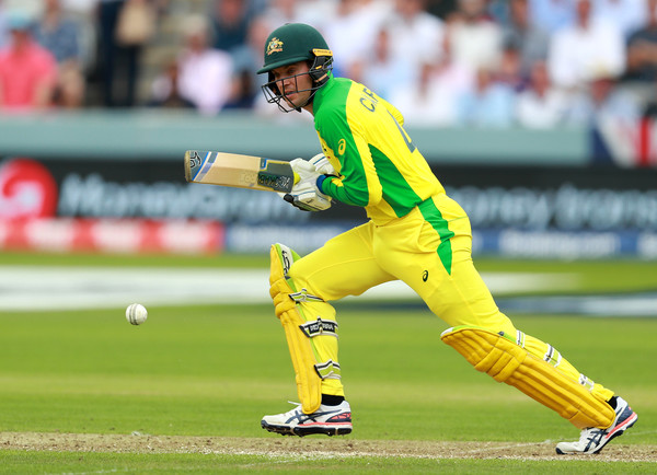 t20 world cup 2020-alex carey in yellow australia jersey playing a cricketing shot
