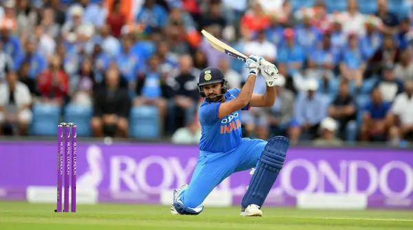 news for bcci-rohit sharma hitting a cover drive in indian blue jersey