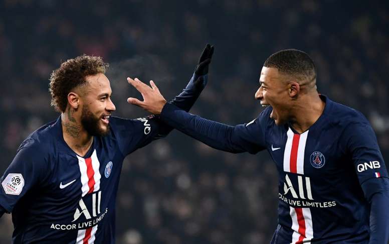 psg news-neymar and mbappe celebrating after goal in blue psg jersey