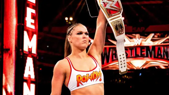 ronda rousey return wwe-ronda rousey in white top holding championship
