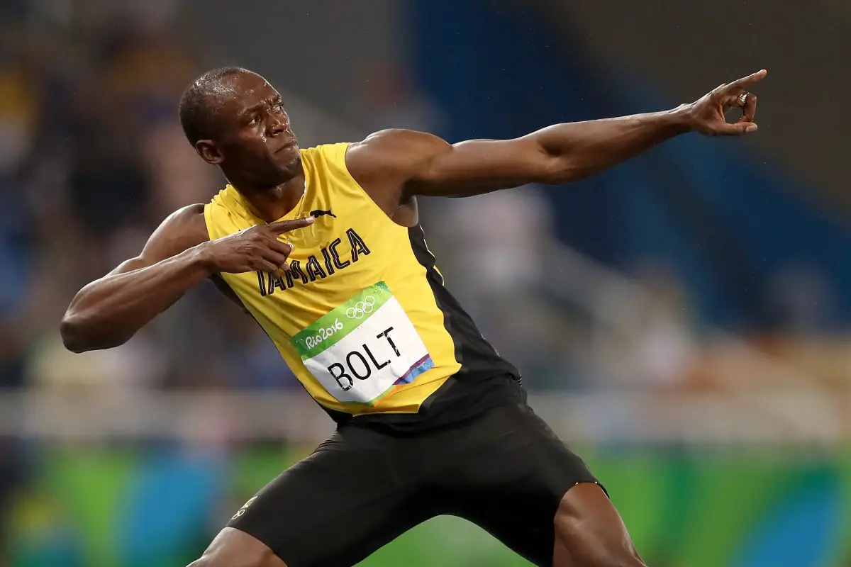 greatest male sprinters of all time- usain bolt in yellow jamaican jersey
