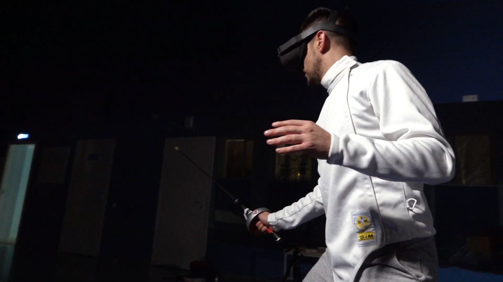 sports industry trends 2021- player with white jersey and vr headset in eyes